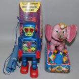 A boxed battery-operated remote control high-wheel robot No. 5023, with lighted eyes and bpody,