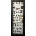 A cased collection of historic artefacts and medieval finds, to include buttons; Royal Belgian Navy,