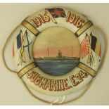 A WWI Souvenir in the form of a 21cm diameter life belt hand painted with flags, the dates 1915-1916