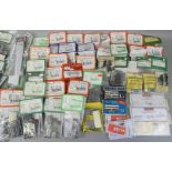 A large collection of approximately one hundred railway related kits and accessories, to include '