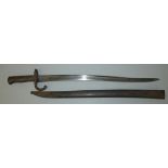 A French Chassepot bayonet, the serpentine fullered blade 57.5cm long marked, Novembre 1867, with