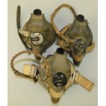 Three post WWII "H" type oxygen masks with microphones and wiring, two with webbing, sizes medium (