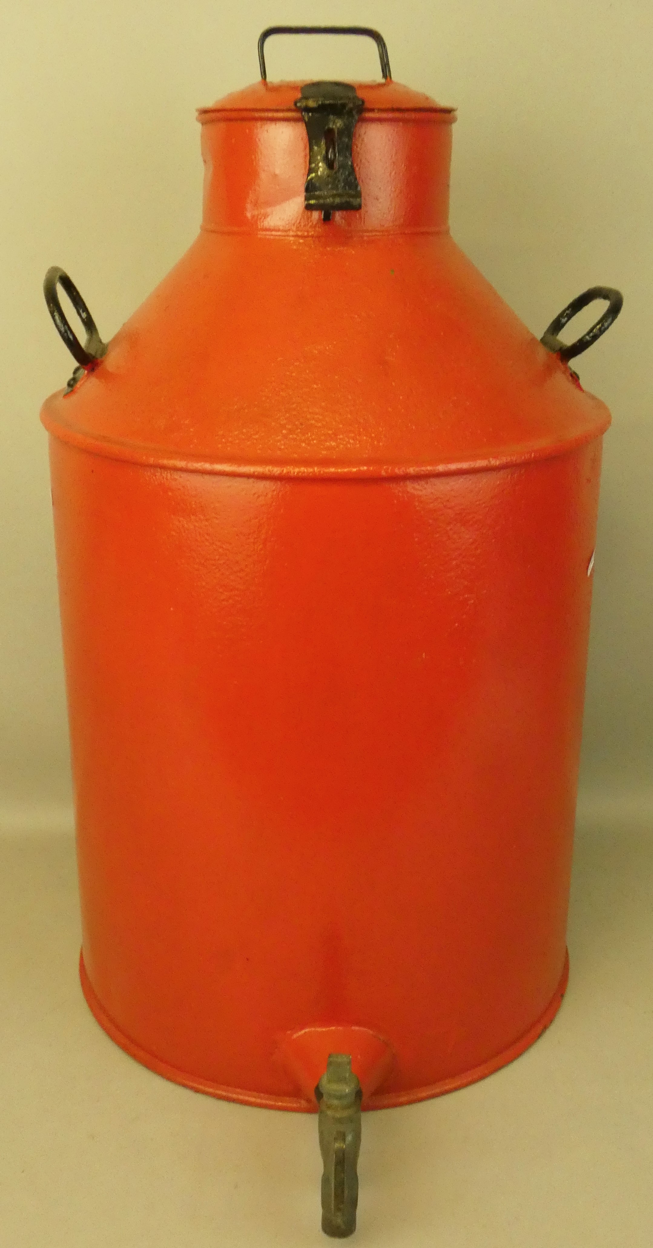 A large repainted oil container with original brass tap, height 66cm.