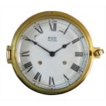 FCC, a 6" dial brass bulk head clock, the white enamel dial with Roman numerals and eight bells on/