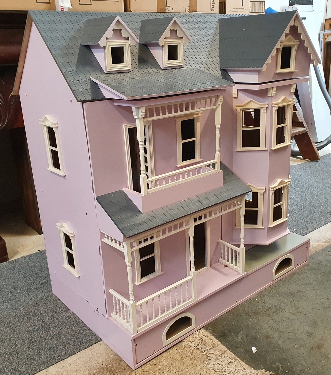 A scratch built large dolls house, the double opening front and lifting roof, storage drawer - Image 4 of 4