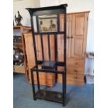 An Edwardian ebonised hallstand with glove box, 68 x 25 x 184 cm and an Edwardian mahogany