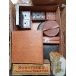 A Victorian rosewood tea caddy and a quantity of advertising tins and boxes (4).
