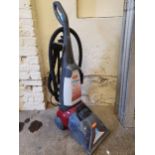 A VAX Rapide PowerJet Pet Carpet Washer, model V-028PET, with accessories.