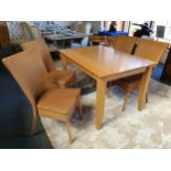 A light oak dining table, 120 x 85 cm together with four contemporary Lloyd Loam dining chairs (5).