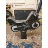 A Wicksteed 5000 black painted metal playground motorcycle, height 80 cm.