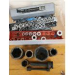 A large quantity of sockets, both MM and Imperial, a torque wrench and other tools.