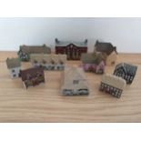 Wade; a collection of ten miniature houses, the largest 8 cm (10).