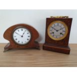 A 19th century French rosewood and boxwood inlaid mantle clock, the Parisian movement striking the