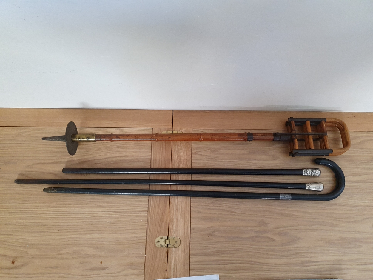A vintage bamboo and steel shooting stick, 2 white metal mounted ebonised hardwood canes and a - Image 2 of 2