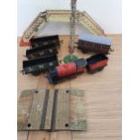 Hornby 'O' gauge - a No. 3435 locomotive and tender in red livery, various tin plate LMS wagons,