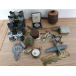 Four pairs of opera glasses, a pair of spurs and other collectibles.