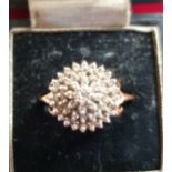 A 9ct gold diamond cluster ring, approximately 0.25ct, 4.4 gm.