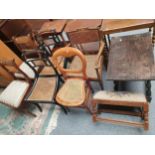 A Victorian pair of mahogany dining chairs, a pair of ebonised dining chairs, two cane seat