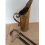 Trench Art; a brass shell dated 1909 formed as a jug with copper handle and two silver mounted