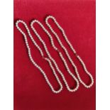 Three uniform single row cultured pearl necklaces, 6 mm diameter, length 45 cm, cased, (3).