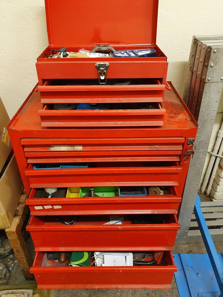 A six drawer tool chest and a smaller two draw chest, containing various tools.