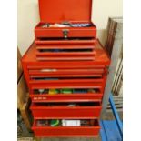A six drawer tool chest and a smaller two draw chest, containing various tools.