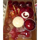 A ruby glass pedestal bowl with gilt decoration, six matching pedestal bowls, a pair of wine glasses