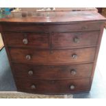 A Victorian mahogany bow front chest of two short over three graduated long drwaers, glass