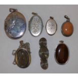 Three silver lockets, three silver pendants and a brooch