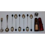 A set of six silver coffee bean spoons, Birmingham 1924, two silver salt spoons, a ring and a