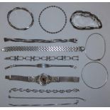 Various silver bracelets to include a garnet bracelet