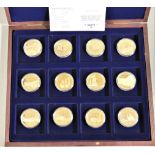 A limited edition proof gold plated "History of the Steam Train" collection of 12, cased