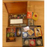 A collection of gramophone needles in cases, 5 x Festival of Britain crowns, various crowns and