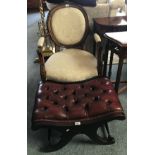 A red leather button upholstered foot stool, another similar and an upholstered armchair (3).