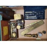 A brass set of postal scales, two brass mounted spirit levels and other collectables.