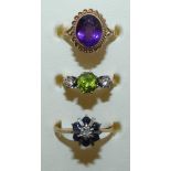A 9ct gold amethyst dress ring, a sapphire and diamond cluster ring and another dress ring, weight