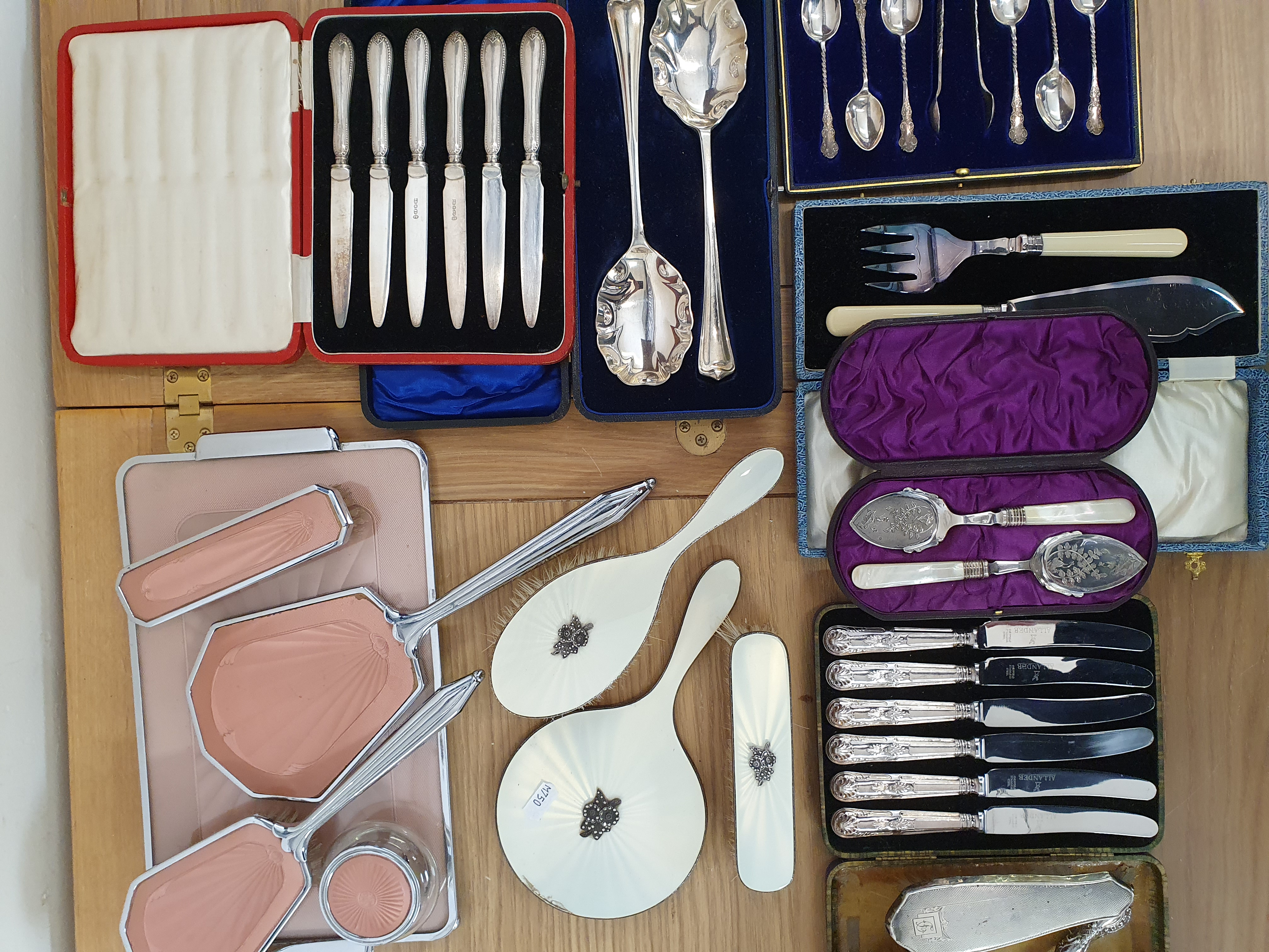 A silver and white guilloche enamel three piece dressing table set, Birmingham 1960, a silver