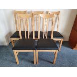Ikea; a set of 8 beech Mackintosh style dining chairs, with leatherette seats (8).