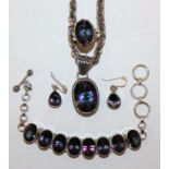 A silver and "mystic topaz" pendant chain, matching ring, bracelet and earrings