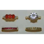 Four 9ct gold gem set rings, weight 9g