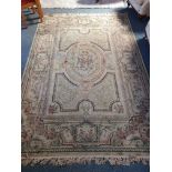 A Belgium Beluchi man made fibre rug, 200x290cm