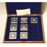 A limited edition 14ct gold proof "7 Wonders of the Ancient World" coin set, 7 x 0.5g,