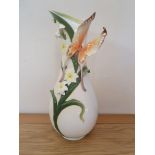 A Graff porcelain baluster vase with applied floral decoration, 41 cm.