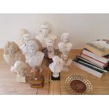 A collection of mainly plaster busts, depicting composers, including Beethoven, Chopin and Mozart,