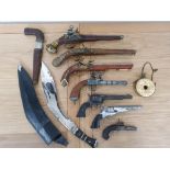 A Kukri with leather scabbard, a 19th century pistol, AF, 6 reproduction pistols and a knife.
