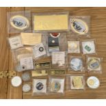 Three 14ct gold proof replica coins 0.5g each and a quantity of gold and silver plated commemorative