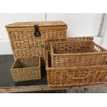 A wicker trunk, two wicker baskets and another basket (4).