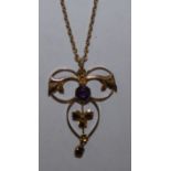 An Edwardian gold amethyst openwork pendant to a later 9ct gold chain, weight 5g