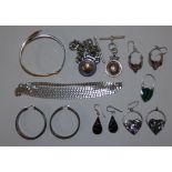 A pair of silver and garnet earrings and other silver jewellery