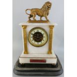 A 19th century French white marble and gilt metal exposed escapement mantle clock, the architectural